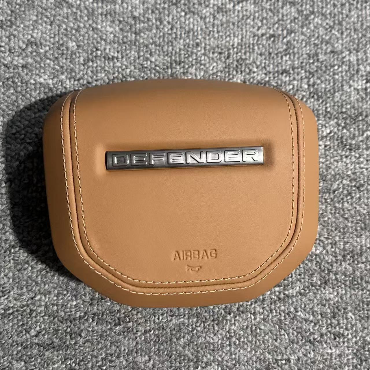 Customized and adapted steering wheel cover plate for Land Rover Range Rover Discovery, Range Rover Evoque, Aurora, Defender with genuine leather and new speaker cover.