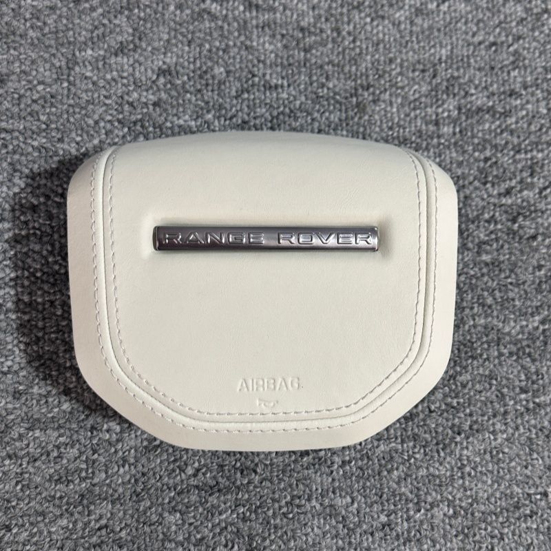 Customized and adapted steering wheel cover plate for Land Rover Range Rover Discovery, Range Rover Evoque, Aurora, Defender with genuine leather and new speaker cover.